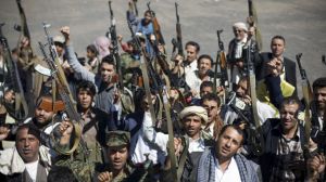 Houthis militants gather as they raid a city.